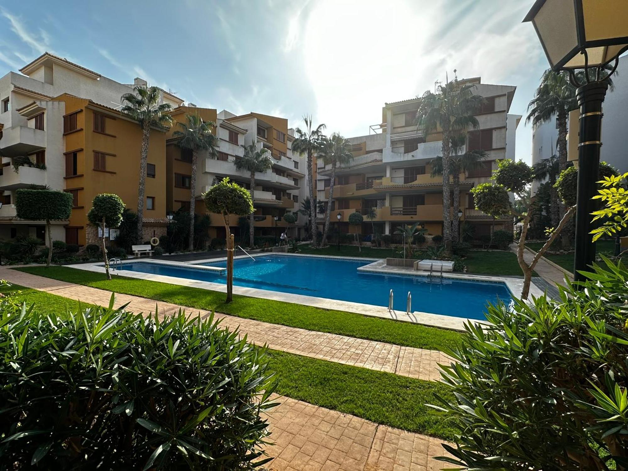 Ground Floor Punta Prima Looking At The Pool Apartment *